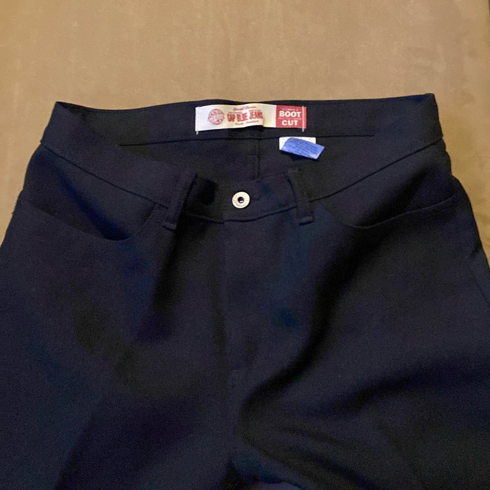 Brand NEW Boot Cut Gap Blue Jeans. 100% polyester